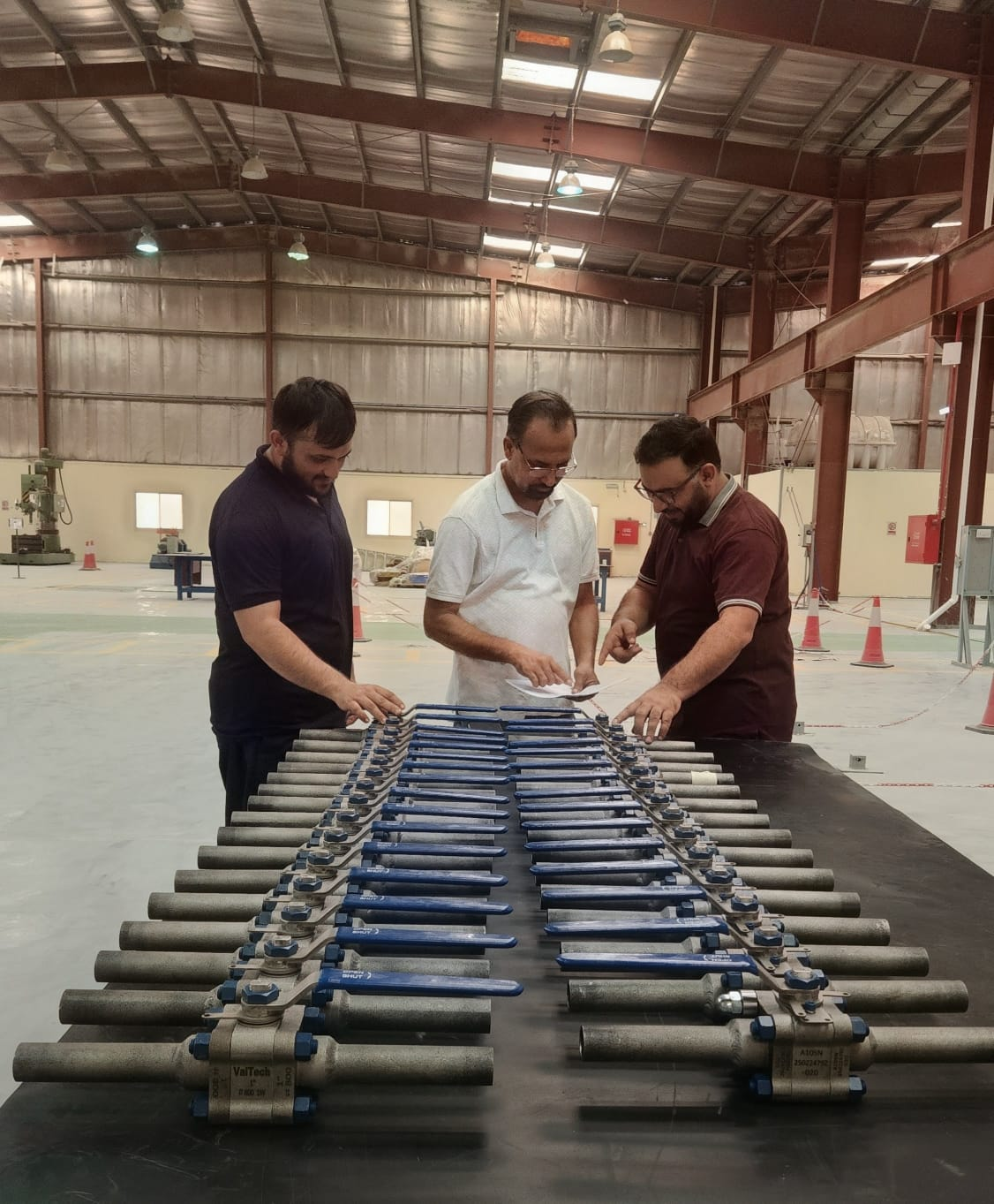VALTECH team inspecting valves